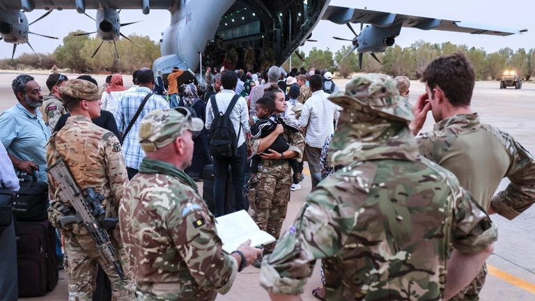 The evacuation of British Nationals onto an awaiting RAF aircraft at Wadi Seidna Air Base in Khartoum, Sudan