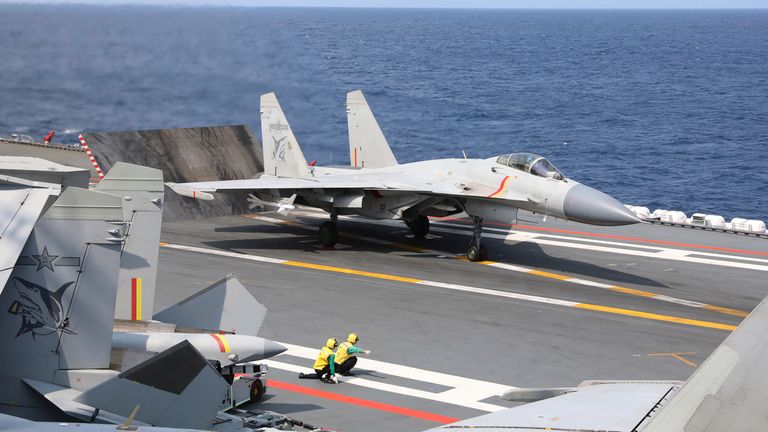 In this photo released by Xinhua News Agency, a J-15 Chinese fighter jet prepares to take off from the Shandong aircraft carrier during the combat readiness patrol and military exercises around the Taiwan Island by the Eastern Theater Command of the Chinese People&#39;s Liberation Army (PLA) on Sunday, April 9, 2023. China&#39;s military declared Monday it is "ready to fight" after completing three days of large-scale combat exercises around Taiwan that simulated sealing off the island in response to the Taiwanese president&#39;s trip to the U.S. last week. (An Ni/Xinhua via AP)