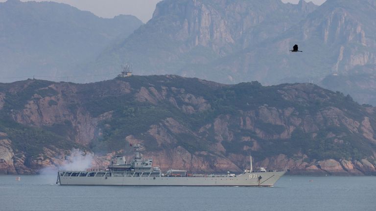 A Chinese warship fires during a military drill off the Chinese coast near Fuzhou, Fujian Province, across from the Taiwan-controlled Matsu Islands, China, April 11, 2023. REUTERS/Thomas Peter
