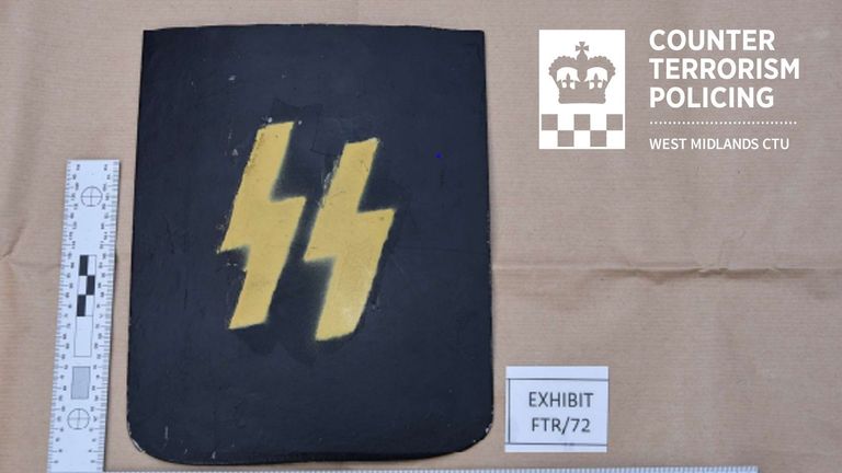 The inside of Dolphin&#39;s shed was decorated with a badge from the Nazi Waffen SS
