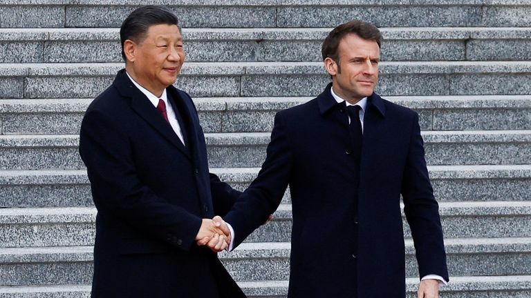 Chinese President Xi Jinping welcomes French President Emmanuel Macron at the Great Hall of the People, in Beijing, China, April 6, 2023. REUTERS/Gonzalo Fuentes
