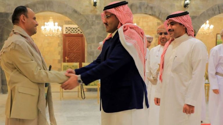 Field Marshal Mahdi Mohammed Al-Mashat, Chairman of the Supreme Political Council, shakes hands with the Saudi ambassador to Yemen Mohammed Al-Jabir in Sanaa on 9 April 2023