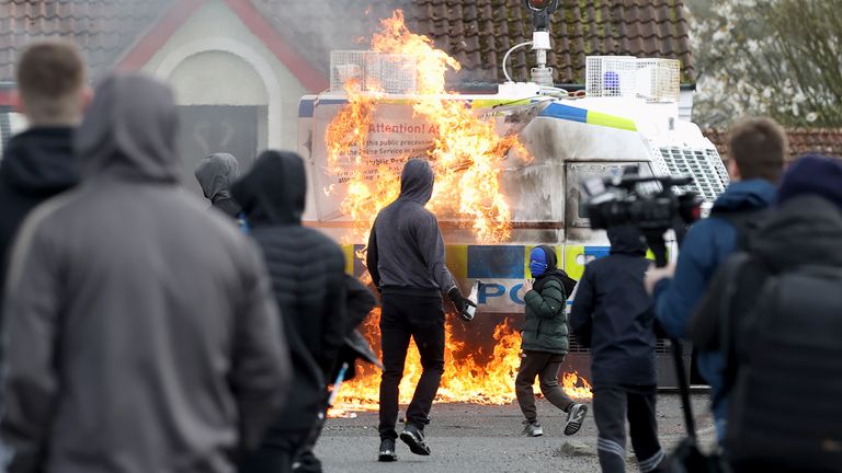 Youths throw petrol bombs at a PSNI vehicle ahead of a dissident Republican parade in the Creggan area of Londonderry on Easter Monday. Authorities have increased security measures in response to the unnotified parades being held in Derry. Picture date: Monday April 10, 2023.
