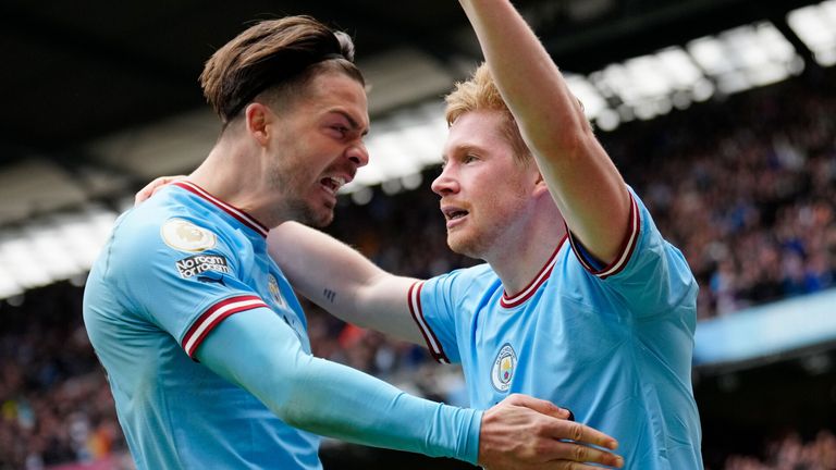 Goalscorers Jack Grealish and Kevin De Bruyne celebrate during Man City&#39;s demolition of Liverpool