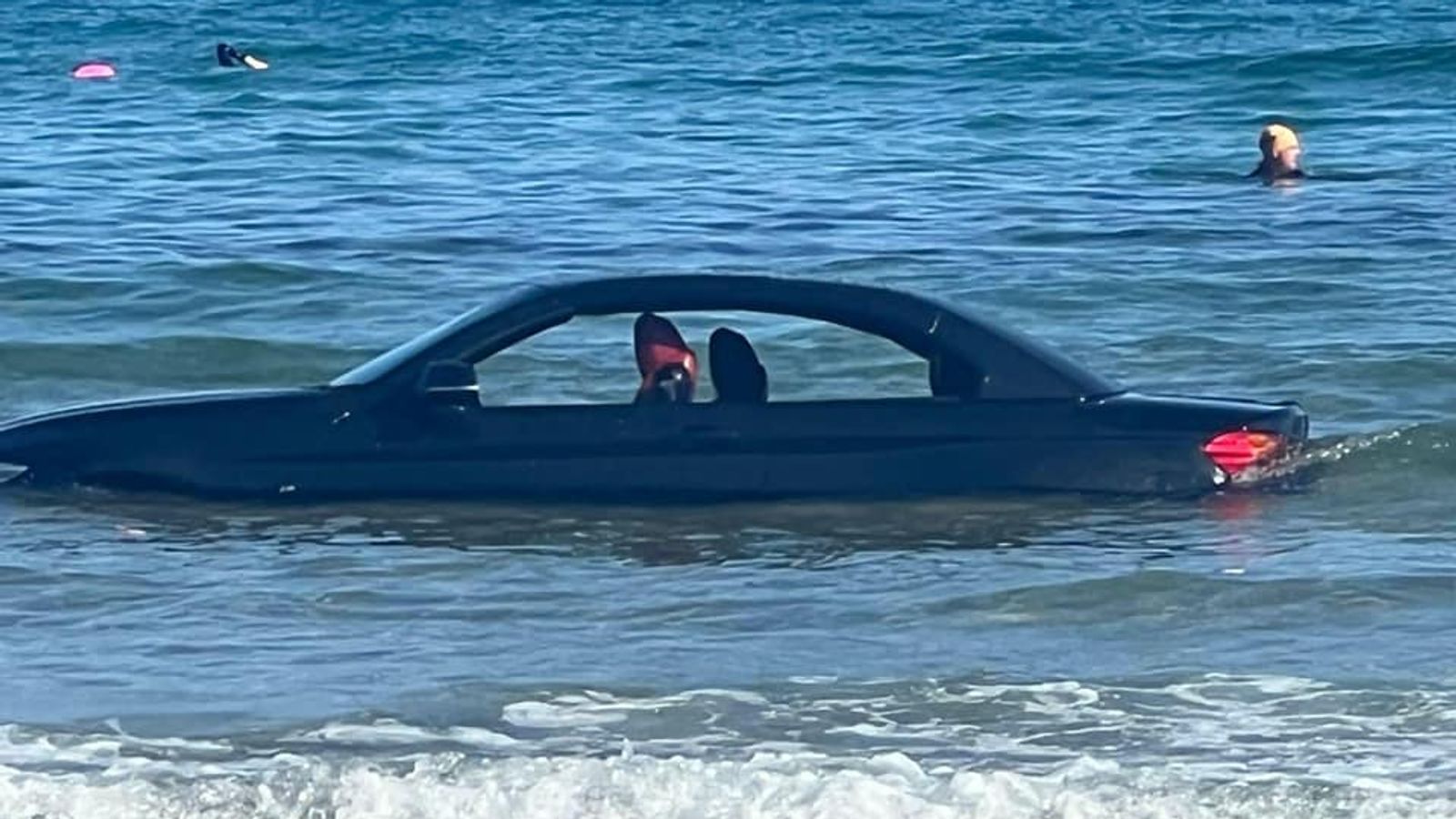 BMW washes out to sea after parking on Cornwall beach