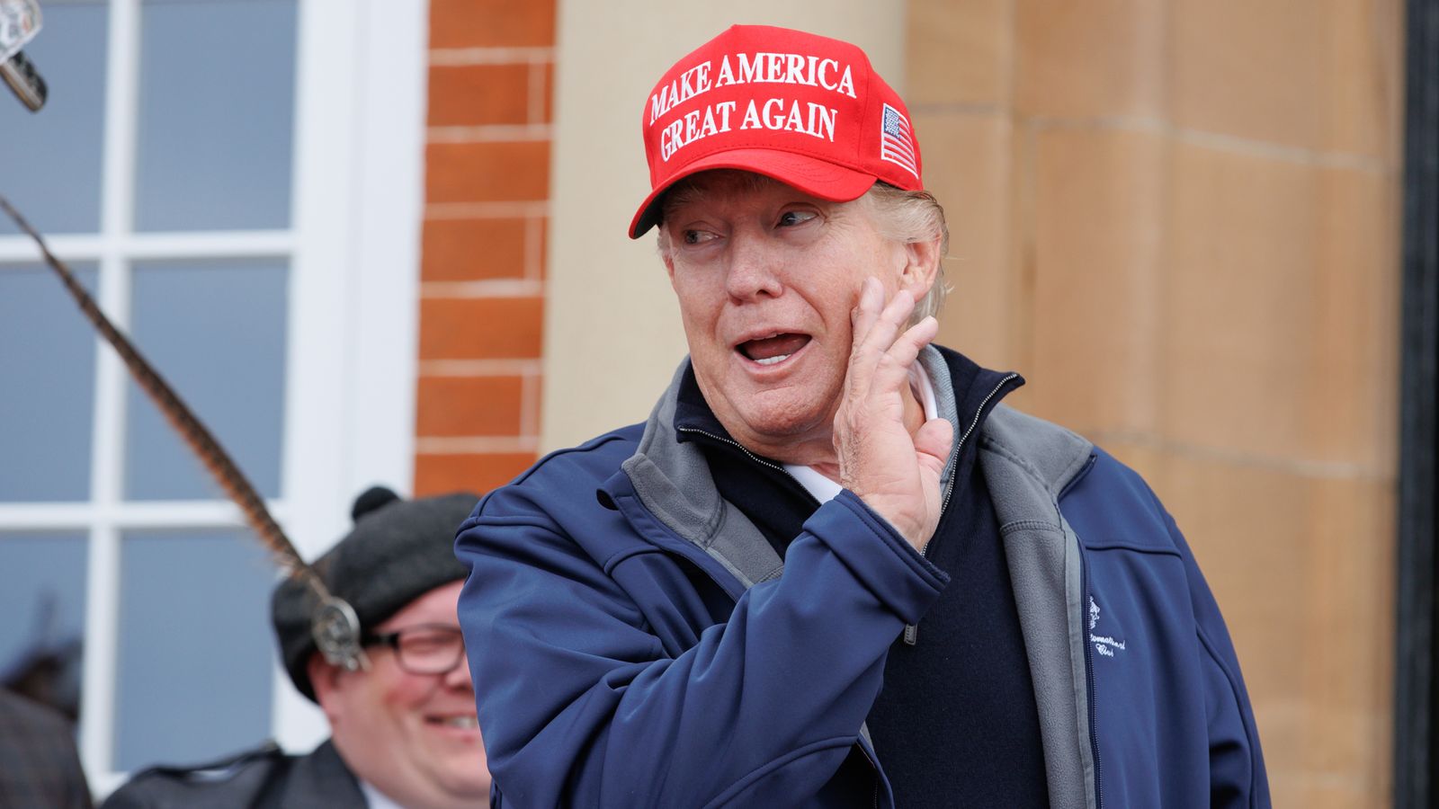 Donald Trump greeted by hat-waving workers at Turnberry golf resort ...