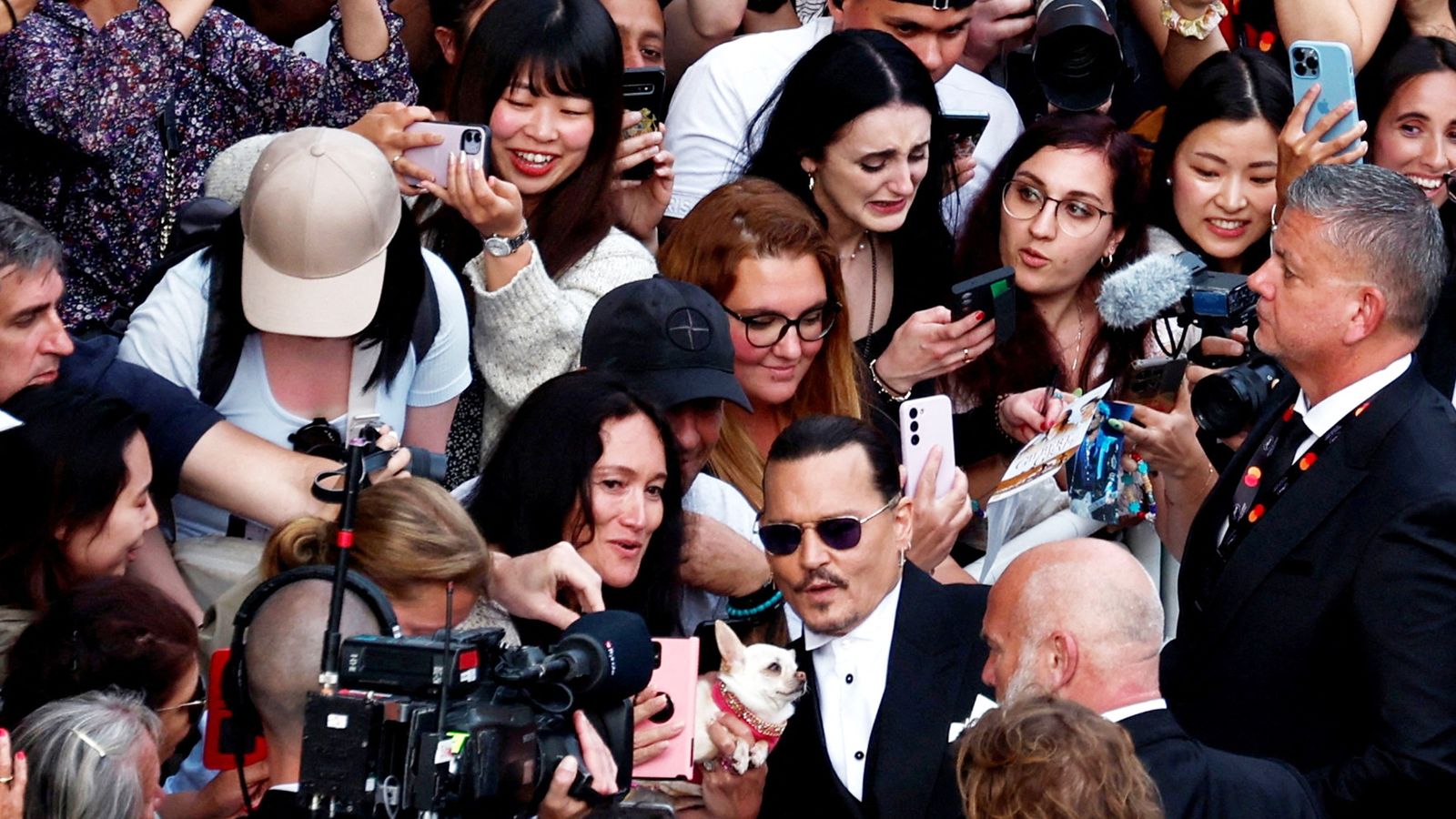 Cannes kicks off with huge standing ovation for Johnny Depp and an award for Michael Douglas