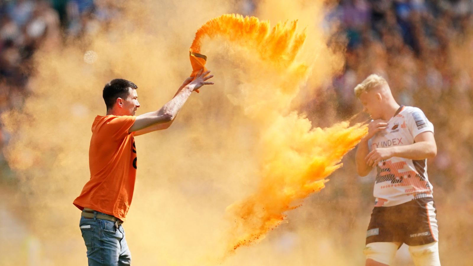 Just Stop Oil protesters invade pitch and throw orange powder at Twickenham rugby last