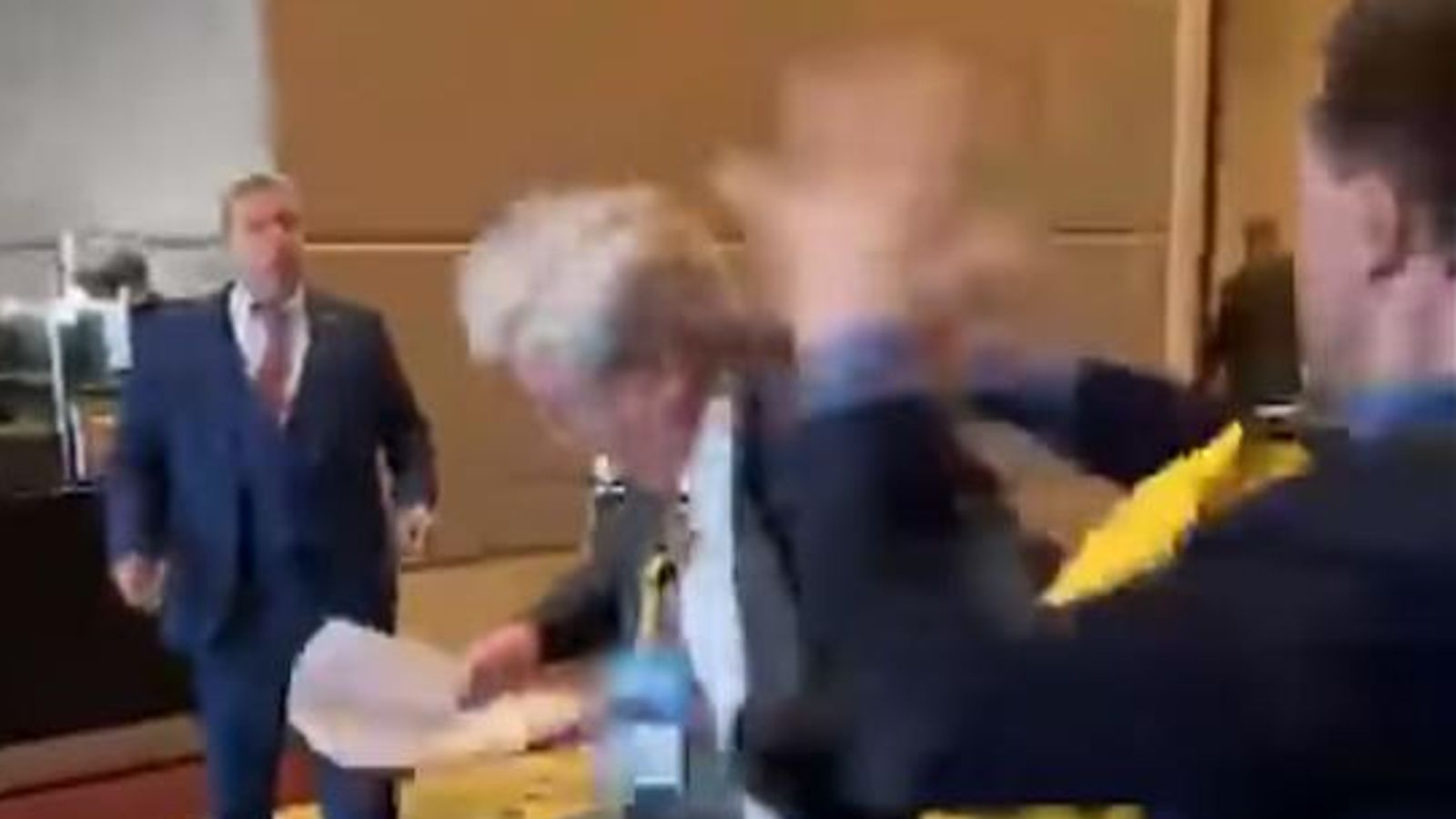 Moment fight breaks out between Russian and Ukrainian delegates at