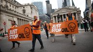 Activists from Just Stop Oil take part in a slow march along a road in the City of London financial district in London, Britain May 22, 2023. REUTERS/Henry Nicholls
