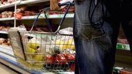EMBARGOED TO 0001 TUESDAY MAY 2 Undated file photo of a person holding a shopping basket in a supermarket