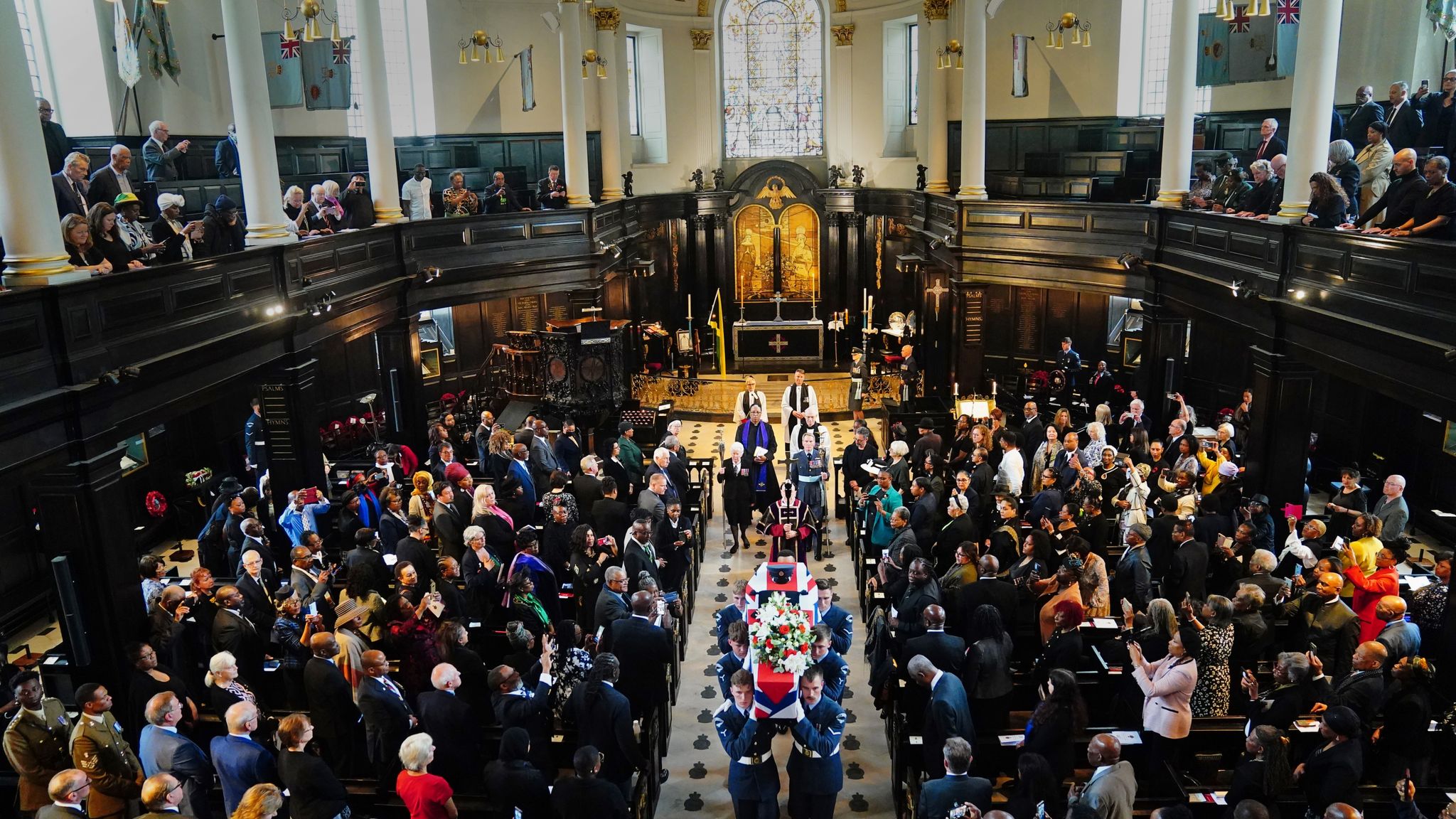 Hundreds of mourners gather for funeral of black RAF pilot who fought ...