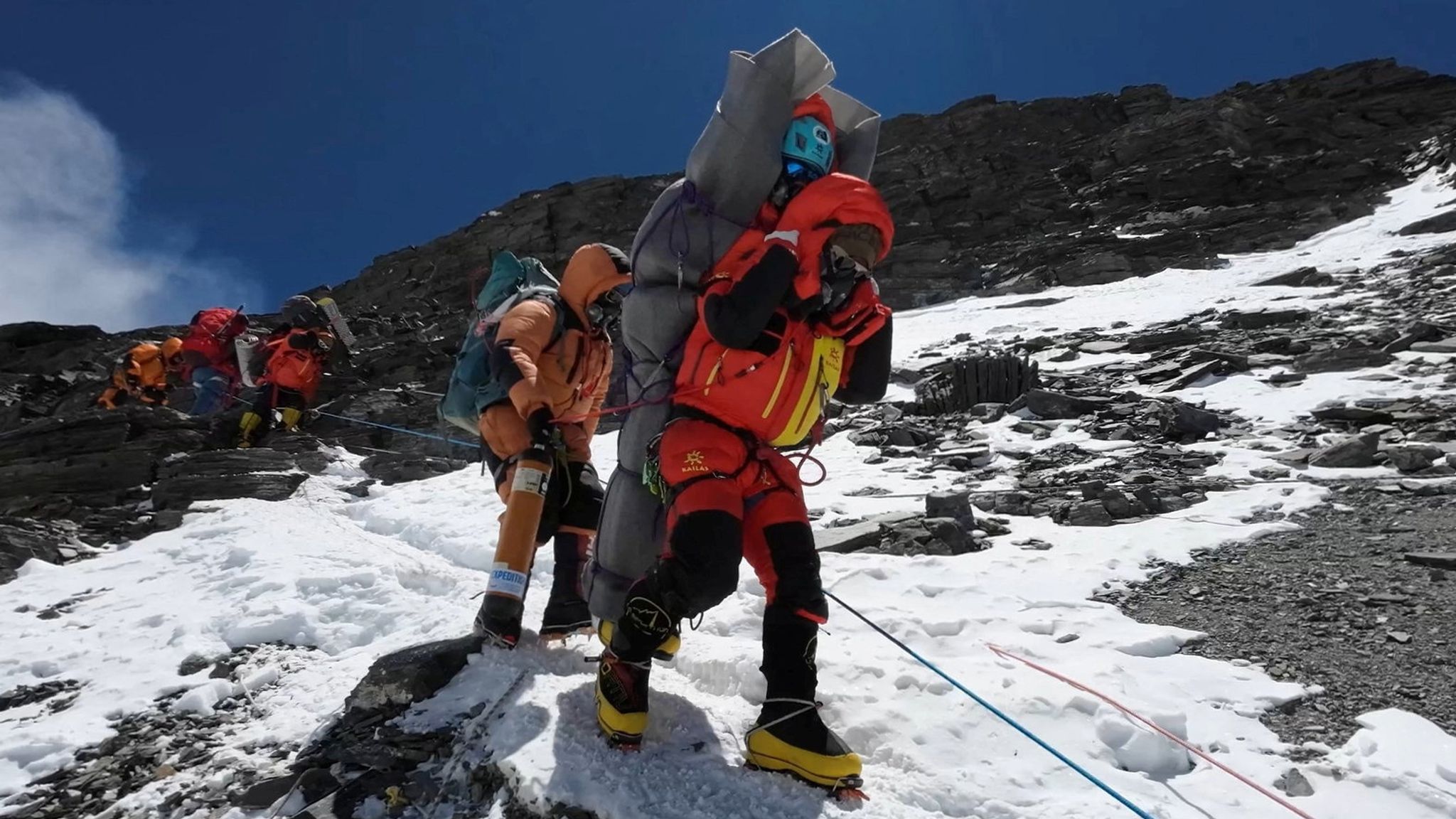 Sherpa guides rescue freezing climber from Everest death zone in