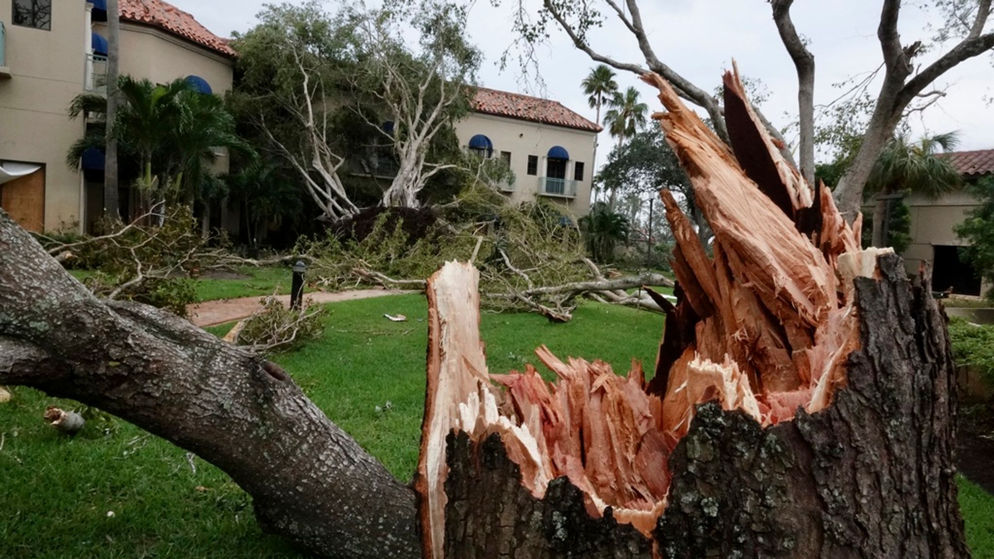 Palm Beach Tornado Wind flips cars and damages homes in coastal