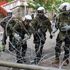 NATO-led troops put up barbed wire in Kosovo after clashes in northern towns