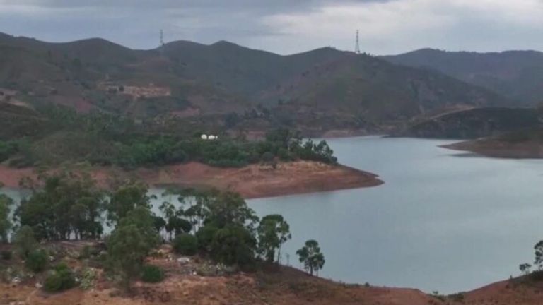 Drone footage shows the ongoing police search at a reservoir in the Algarve, Portugal, about 31 miles from where Madeleine McCann, a British toddler. went missing 16 years ago.  