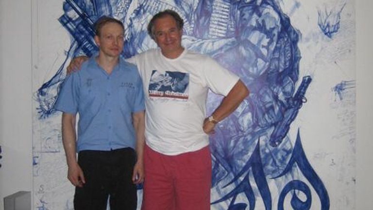 Fabien Nordmann (R) pictured with artist Andrei Molodkin
