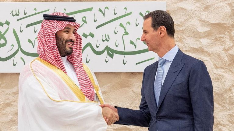 Saudi Arabia&#39;s Crown Prince Mohammed bin Salman shakes hands with Syria&#39;s President Bashar al-Assad 
