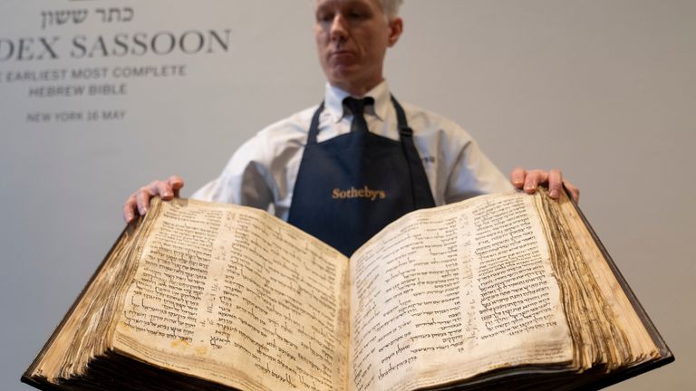 FILE - Sotheby&#39;s unveils the Codex Sassoon for auction, Wednesday, Feb. 15, 2023, in the Manhattan borough of New York. The 1,100-year-old Hebrew Bible that is one of the oldest surviving biblical manuscripts sold for $38.1 million, which includes the auction house&#39;s fee, Wednesday, May 17, 2023, in New York. (AP Photo/John Minchillo, File)