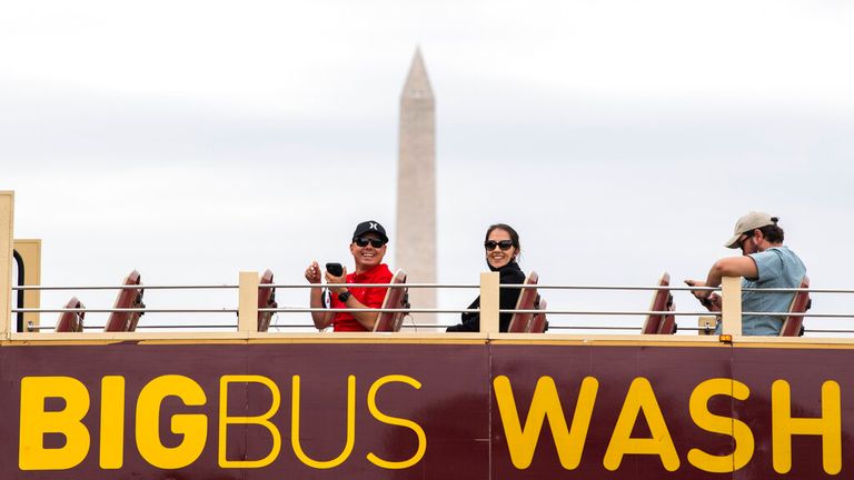 Visitors take a Big Bus tour on  3rd Street on the National Mall in Washington DC in May 2021. (Photo By Tom Williams/CQ Roll Call)   