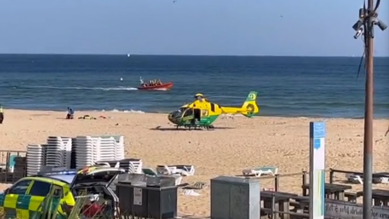 Two people pulled from sea in &#39;multi-agency&#39; incident in Bournemouth.