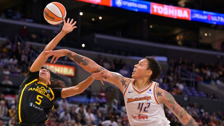 May 19, 2023; Los Angeles, California, USA; Phoenix Mercury center Brittney Griner (42) blocks a shot by Los Angeles Sparks guard Dearica Hamby (5) in the first half at Crypto.com Arena. Mandatory Credit: Jayne Kamin-Oncea-USA TODAY Sports