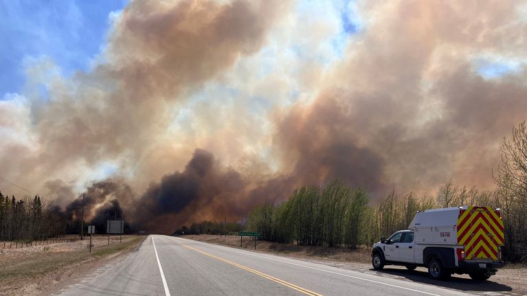 A smoke column rises from wildfire EWF031 near Lodgepole, Alberta, Canada May 4, 2023. Alberta Wildfire/Handout via REUTERS THIS IMAGE HAS BEEN SUPPLIED BY A THIRD PARTY. TPX IMAGES OF THE DAY