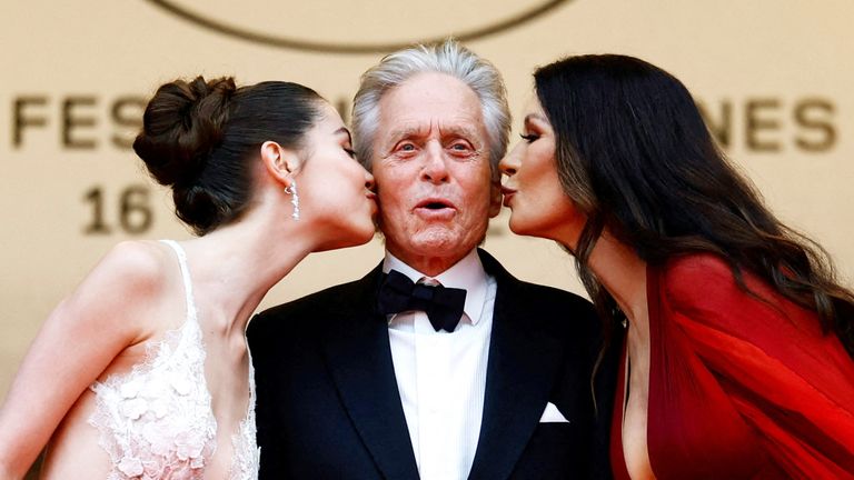 The 76th Cannes Film Festival - Opening ceremony and screening of the film "Jeanne du Barry" Out of competition - Red Carpet arrivals - Cannes, France, May 16, 2023. Michael Douglas, Catherine Zeta-Jones and their daughter Cary pose. REUTERS/Sarah Meyssonnier     TPX IMAGES OF THE DAY     