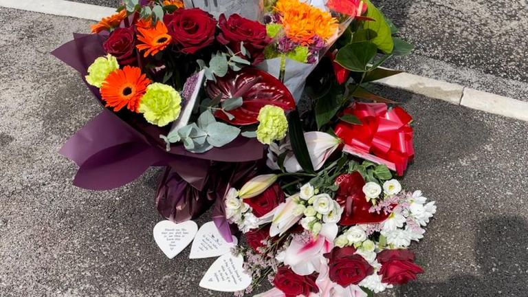 Tributes laid at the scene of a crash in Ely, Cardiff, in which two teenage boys died