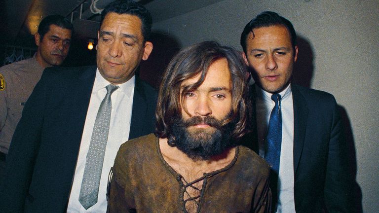 Charles Manson is escorted to his arraignment on conspiracy-murder charges in connection with the Sharon Tate murder case in 1969
Pic:AP
