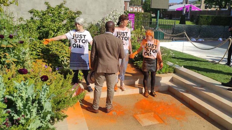 Handout photo issued by Just Stop Oil of three protesters at Chelsea Flower Show who have been arrested on suspicion of criminal damage in connection with a Just Stop Oil protest. Picture date: Thursday May 25, 2023.
