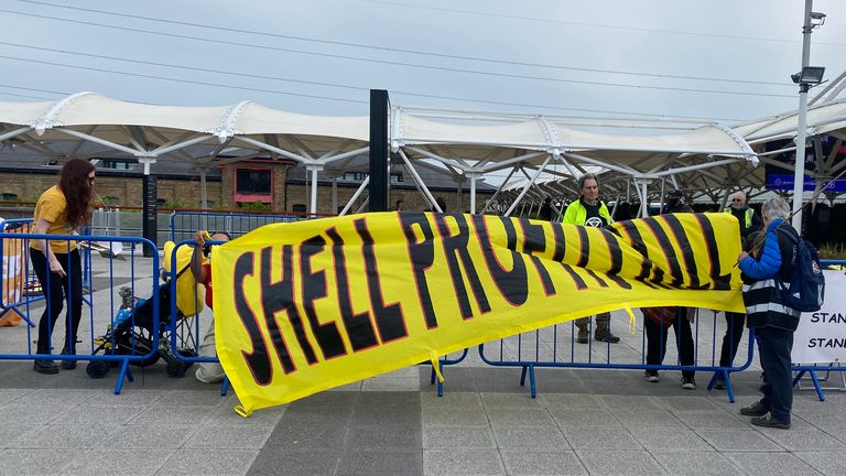 Climate protesters gathering outside the Excel centre in east London ahead of oil giant Shell&#39;s annual general meeting. Groups include Christian Climate Action, a branch of Extinction Rebellion, Catholic protest group Laudato Si&#39; Movement and Quakers for Climate Justice. Picture date: Tuesday May 23, 2023.