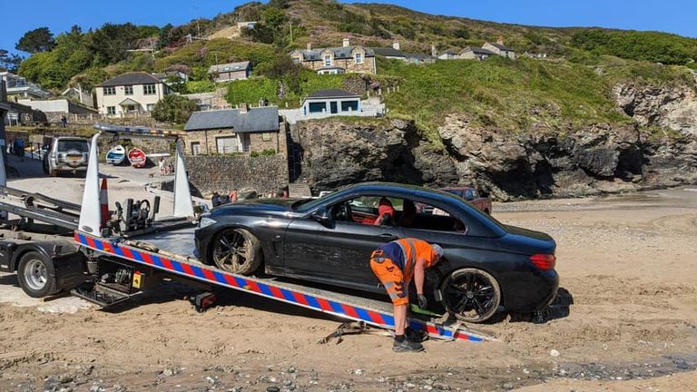 BMW washes out to sea at Trevaunance beach. Pic: St Agnes Coastguard Search and Rescue Team