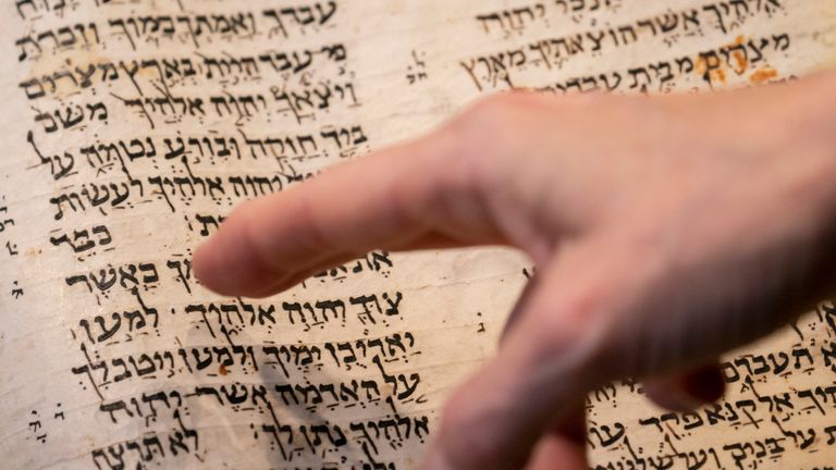 FILE - Sotheby's unveils the Codex Sassoon for auction on Wednesday, February 15, 2023, in New York's Manhattan borough.  The 1,100-year-old Hebrew Bible, which is one of the oldest surviving Bible manuscripts, sold for $38.1 million, which includes the auction house fee, on Wednesday, May 17, 2023 in New York.  (AP Photo/John Minchillo, Files)