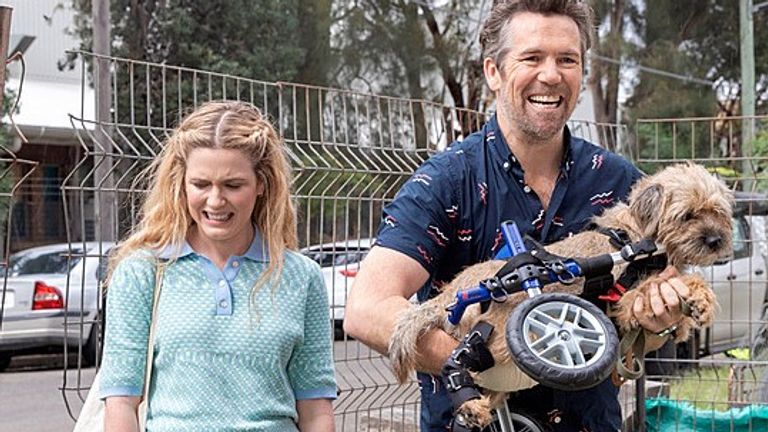 Ashley (Harriet Dyer) and Gordon (Patrick Brammall) in Colin From Accounts. Pic: BBC/ Paramount/ CBS Studios Inc, Easy Tiger Productions/ Foxtel Management/ Create NSW/ Lisa Tomasetti