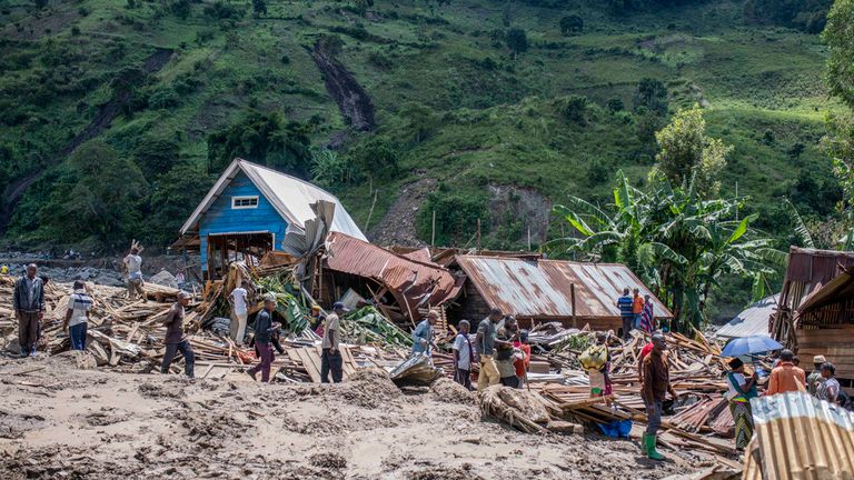 Houses have been destroyed by floods in the village of Nyamukubi. Pic: AP