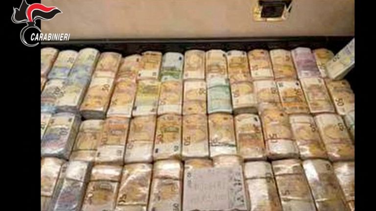 Seized money is displayed in an unknown location following an operation of the Carabinieri del Ros and the Provincial Command of Reggio Calabria in Italy and in various foreign countries 