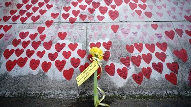 File photo dated 23/3/2022 of flowers by the The National Covid Memorial Wall in London. Bereaved families have warned they may take legal action against the Government over delays to starting the coronavirus public inquiry. The Covid-19 Bereaved Families for Justice group is considering bringing a judicial review over the failure to provide a setting up date for the inquiry into the Government&#39;s handling of the pandemic. Issue date: Monday June 27, 2022.
