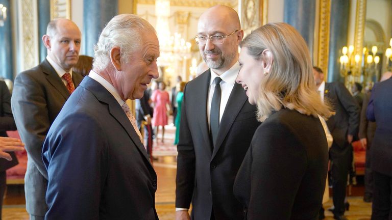 Denys Shmyhal speaks with King Charle and Ukraine&#39;s first lady Olena Zelenska during a reception at Buckingham Palace last week