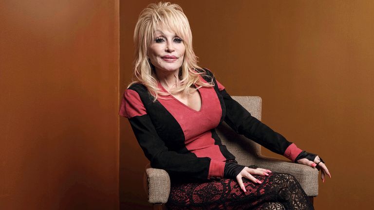 FILE - Dolly Parton poses during the Carnegie Awards for Philanthropy on October 13, 2022 in New York City. Parton will close out the awards show with 