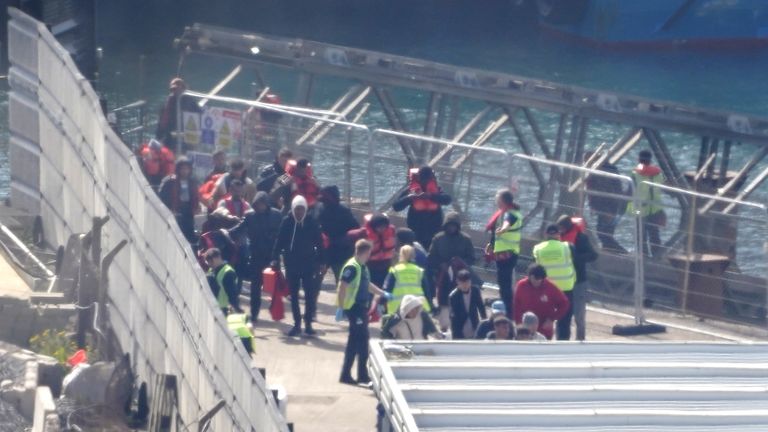 A group of people thought to be migrants are brought in to Dover, Kent, from a Border Force vessel, following a small boat incident in the Channel. Net migration to the UK has climbed to a record level, official statistics show. Around 606,000 more people are estimated to have moved to the UK than left in the 12 months to December, data from the Office for National Statistics on Thursday showed. Picture date: Thursday May 25, 2023.