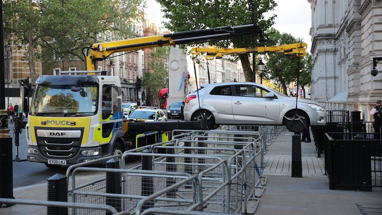 The car was eventually taken away from the scene on a police truck