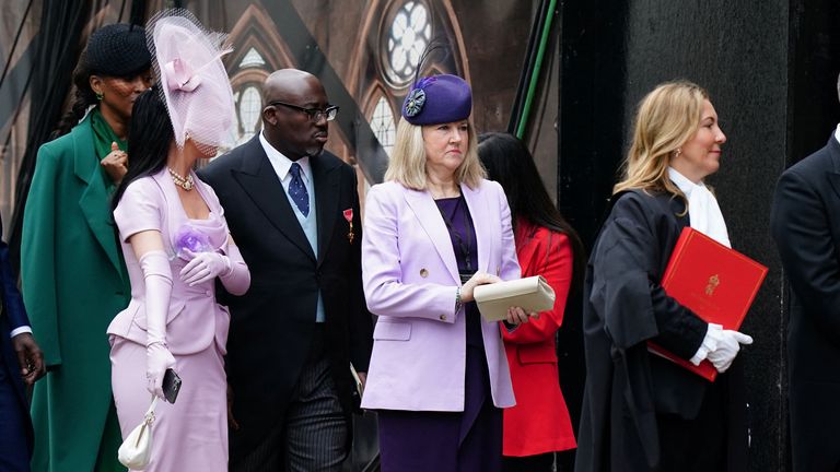  Vogue&#39;s Edward Enninful walking into the abbey with Katy Perry