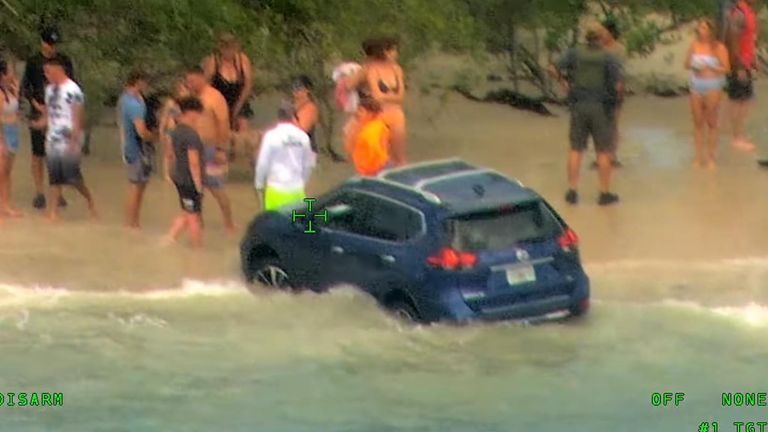 Driver arrested after plowing down Florida beach