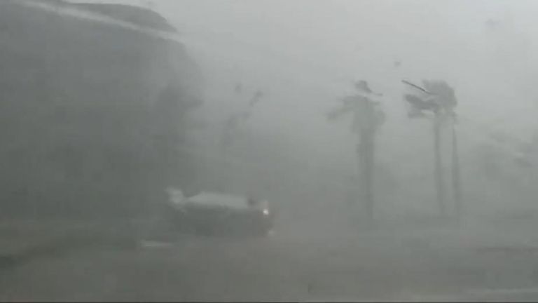 Tornado flips car