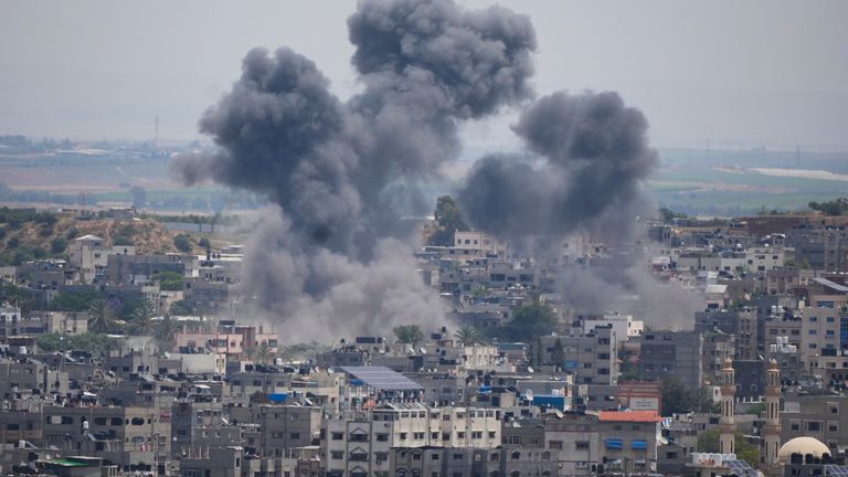 Smoke rises from an explosion caused by an Israeli airstrike, in Gaza Strip, Friday, May 12, 2023. (AP Photo/Hatem Moussa)