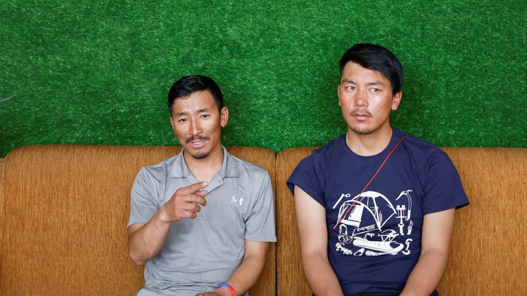 Gelje Sherpa sits along with Ngima Tashi Sherpa, who rescued a Malaysian climber from the death zone above camp four, during an interview with Reuters in Kathmandu, Nepal May 31, 2023. REUTERS/Navesh Chitrakar
