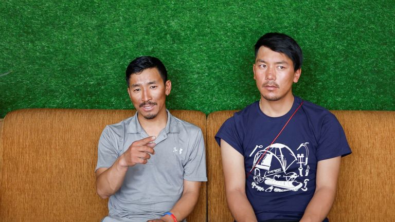 Gelje Sherpa sits along with Ngima Tashi Sherpa, who rescued a Malaysian climber from the death zone above camp four, during an interview with Reuters in Kathmandu, Nepal May 31, 2023. REUTERS/Navesh Chitrakar
