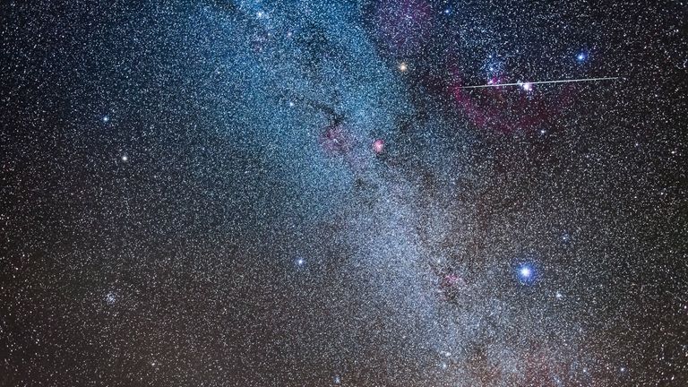 A single Geminid meteor shoots through the Sword of Orion on the peak night of the Geminid meteor shower, December 2017. Pic: AP