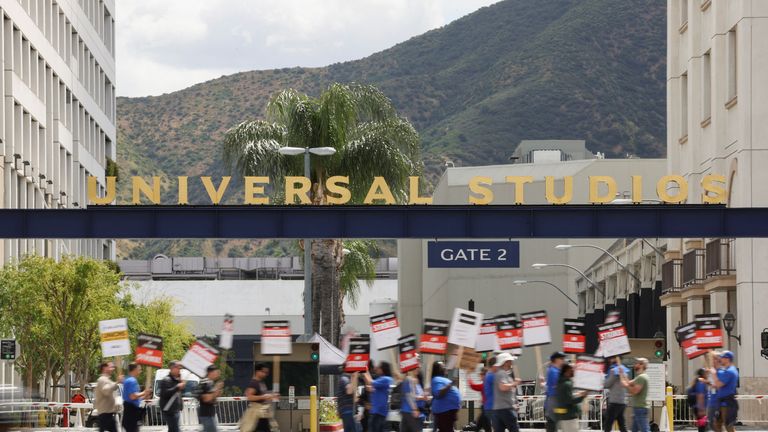Workers and supporters of the Writers Guild of America protest outside Universal Studios Hollywood after union negotiators called a strike for film and television writers, in the Universal City area of Los Angeles, California, U.S., May 3, 2023. REUTERS/Mario Anzuoni
